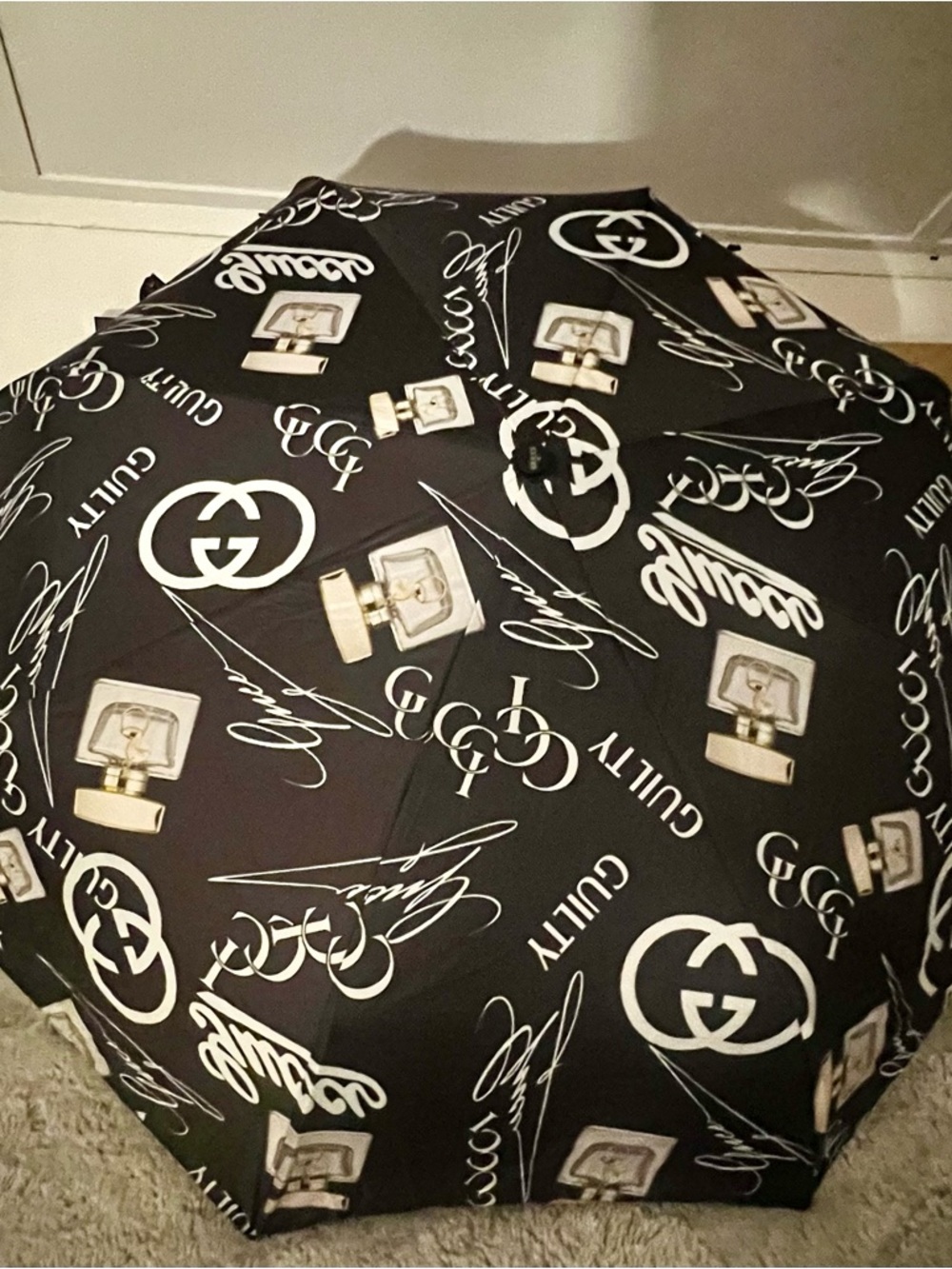 Black Umbrella with White Logo & Perfume Bottle Print